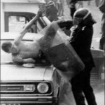 photo_civil_libertiesorgreave Riot police attacking a miner during the infamous Battle of Orgreave